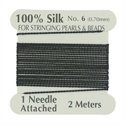 Silke tråd. 0.7 mm. Inkl. nål. Sort